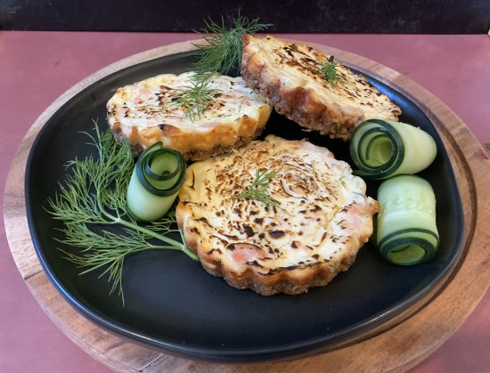 Savory smoked salmon cheesecakes offer a flavorful gluten-free bite