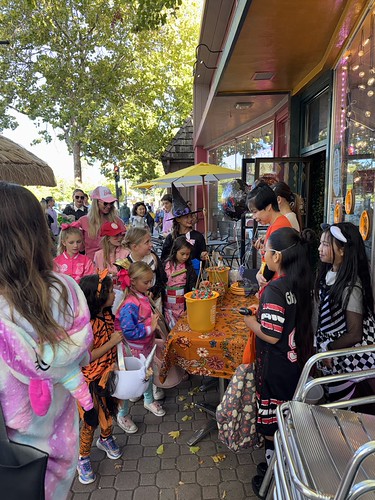 Children and parents traveled to different merchants at last year’s “Trick or Treat Street” event.