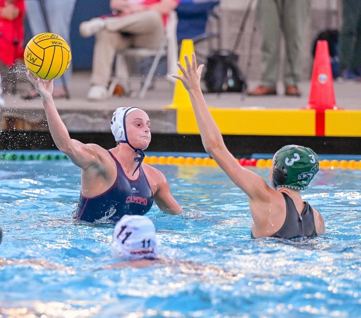 Campolindo’s Lily Holloway (17) shoots over Miramonte’s Hannah Gardner (3) with Campolindo’s Tovah Haroutunian (11) looking on.