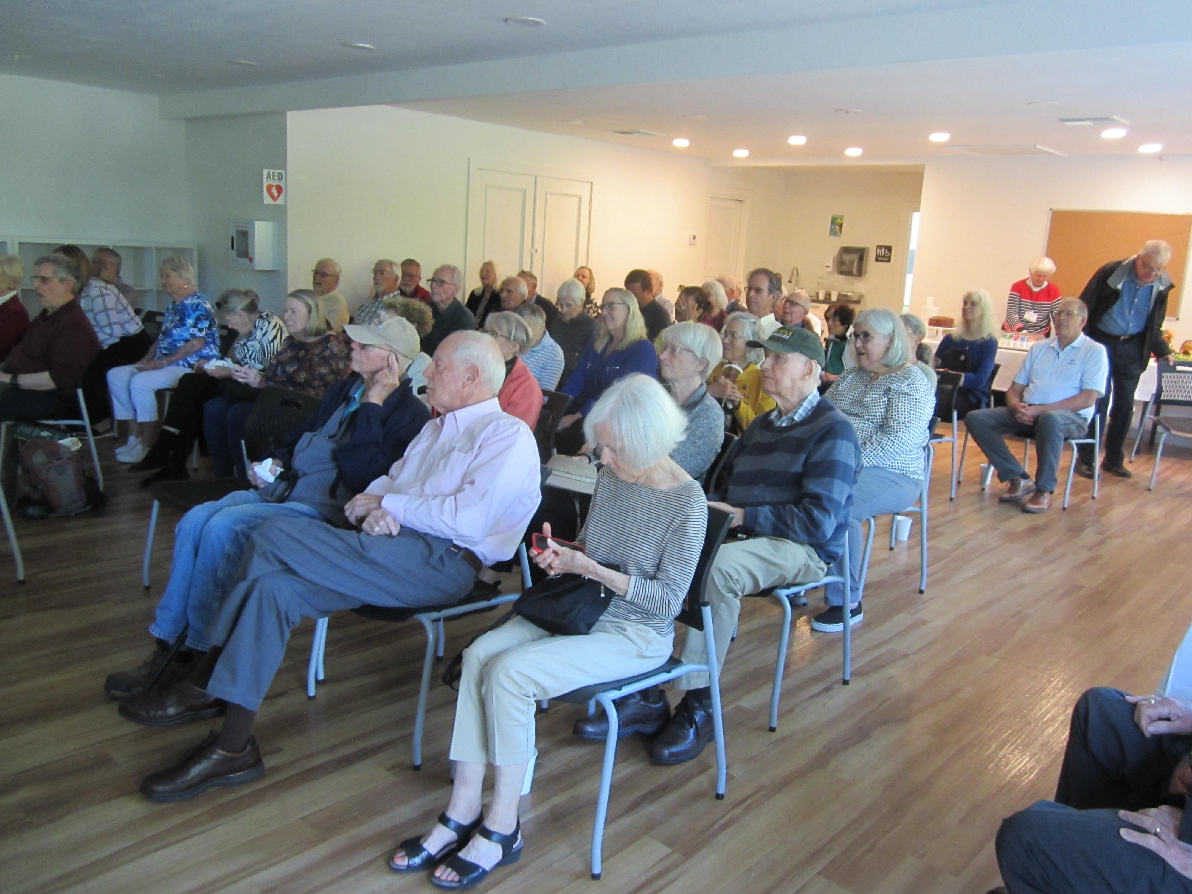 Members watch Moraga Historical Society's 60th Anniversary Video during celebration event.