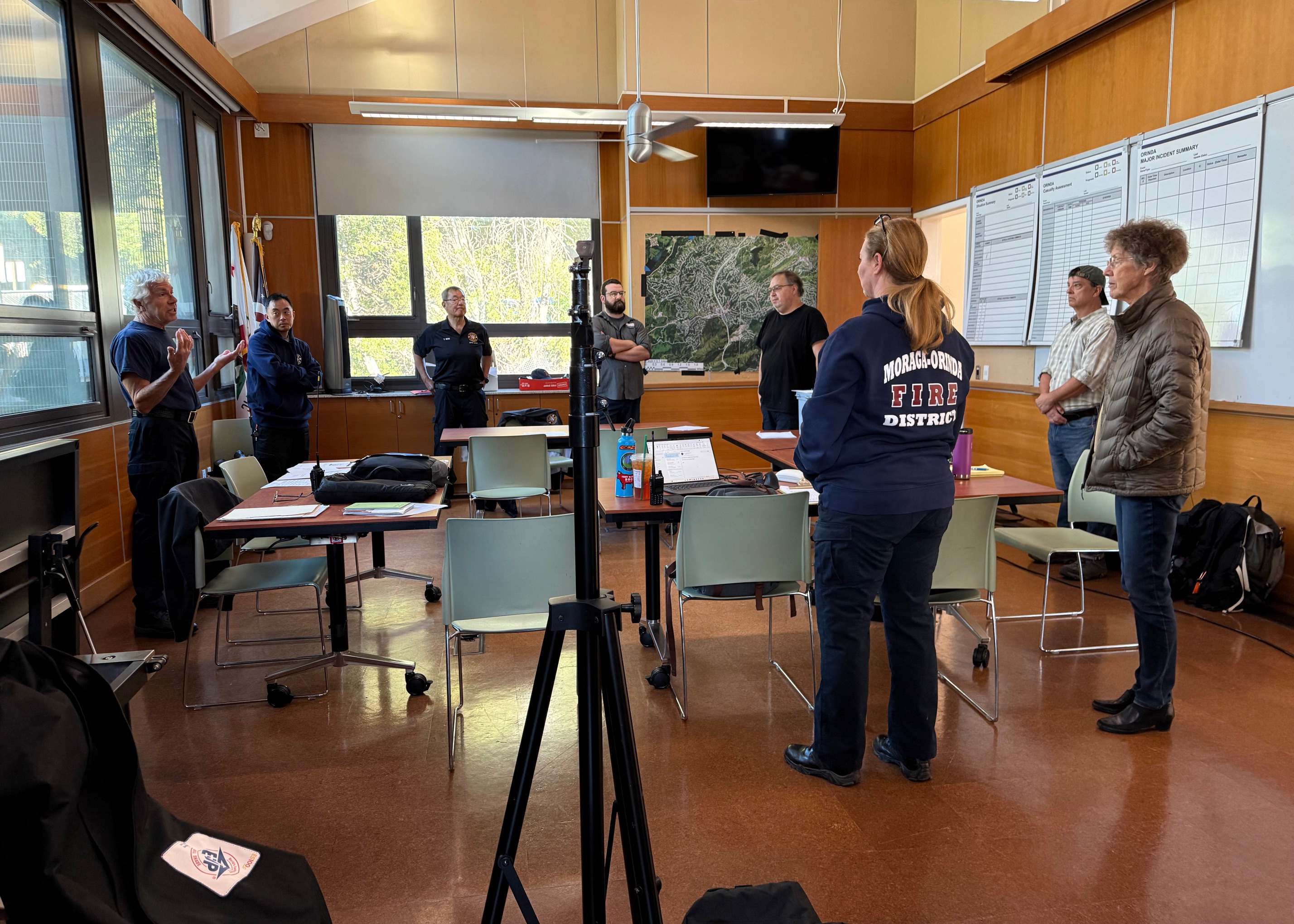 Emergency personnel and volunteers gather at the Sarge Littlehale room in Orinda during the Great Shakeout drill.