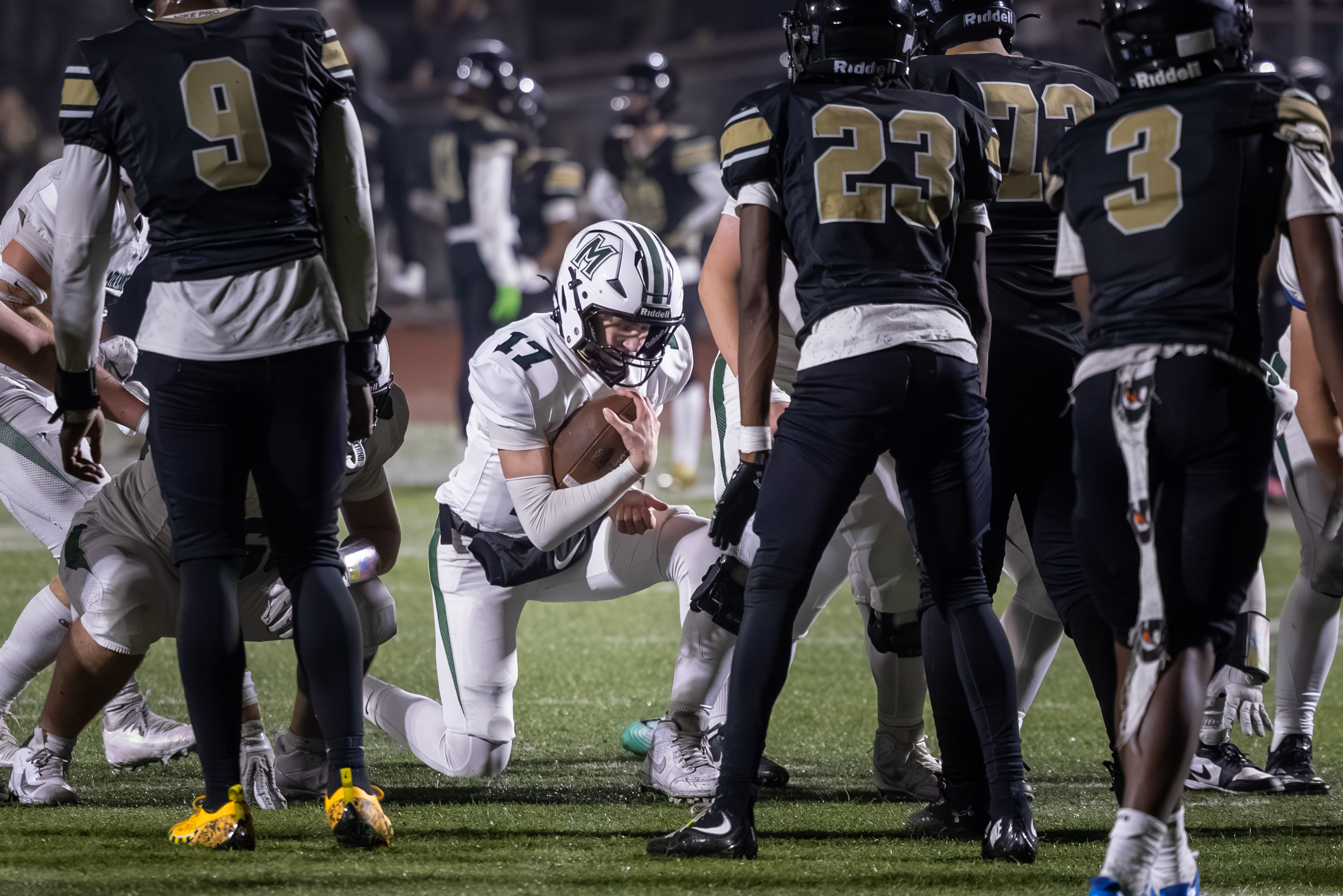 Miramonte quarterback Lane Dalton kneels at the conclusion of the NCS Championship game against Hayward.