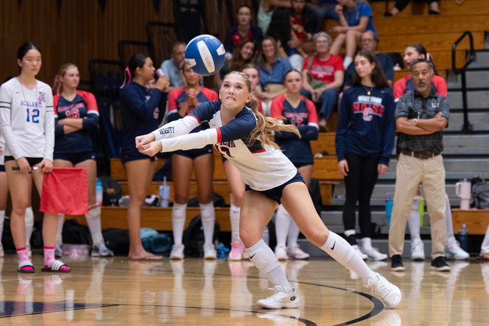 Campolindo’s Grace Thiel (17) making a dig against Acalanes.