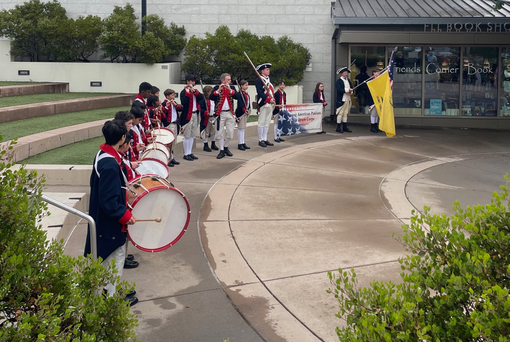 Young American Patriots Fife and Drum Corp prepares for the procession.
