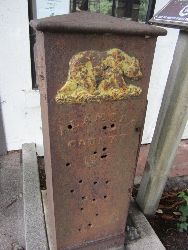 Bullet holes riddle historic boundary marker (the Alameda County side).