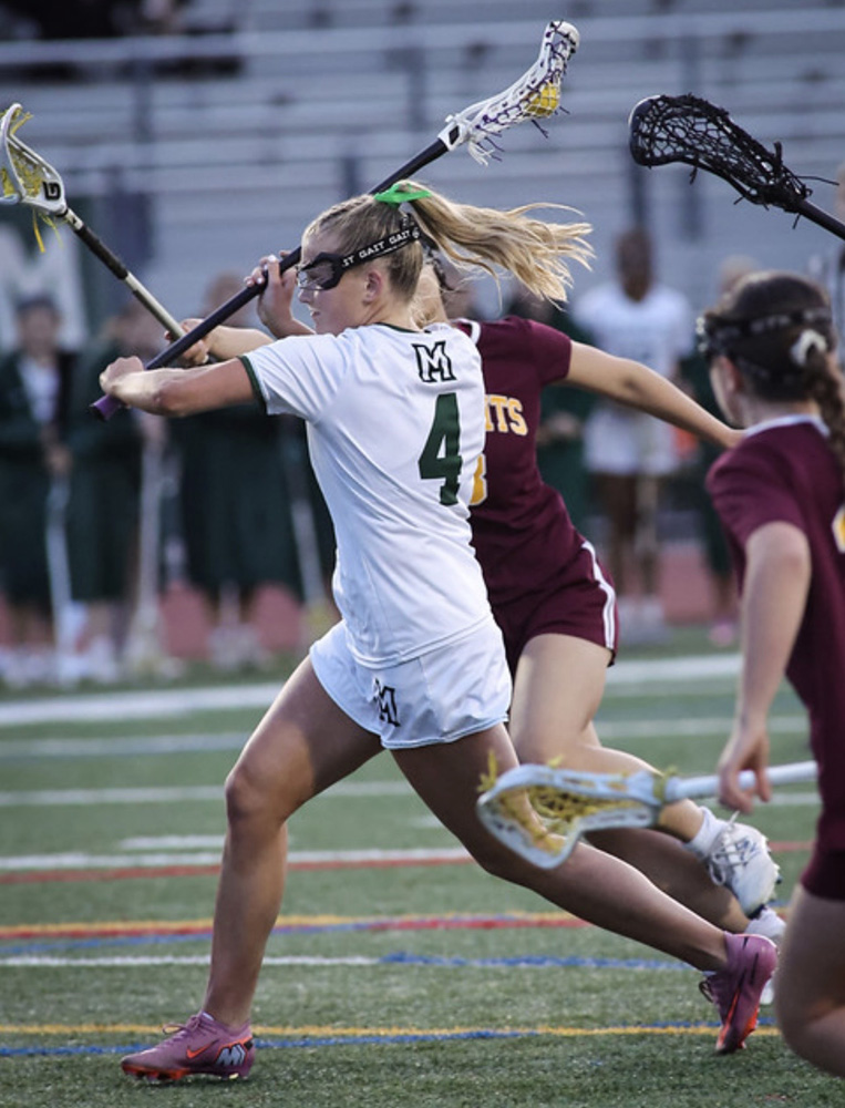 Miramonte midfielder Sawyer Bohlig No. 4 taking a shot on goal.