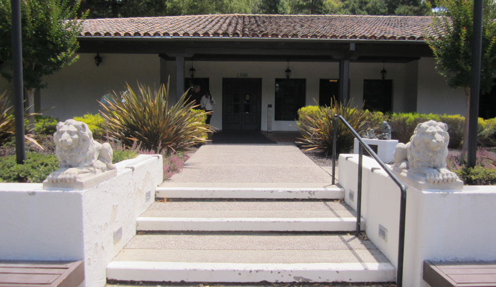 Cement lions stand guard at Moraga Library