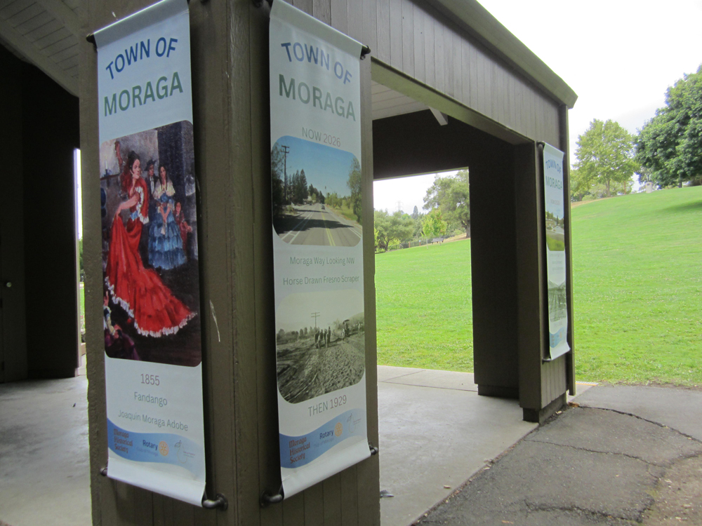 Historical interpretive banners decorate Commons Park bandshell.