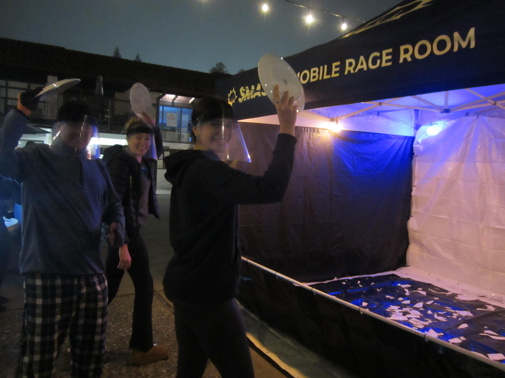 SMC students prepare to smash-a-plate for finals week stress relief.
