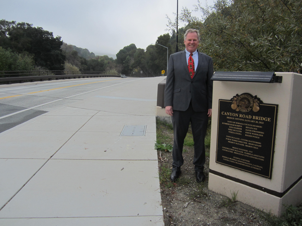 Shawn Knapp stands beside his first Town project – Canyon Road Bridge.